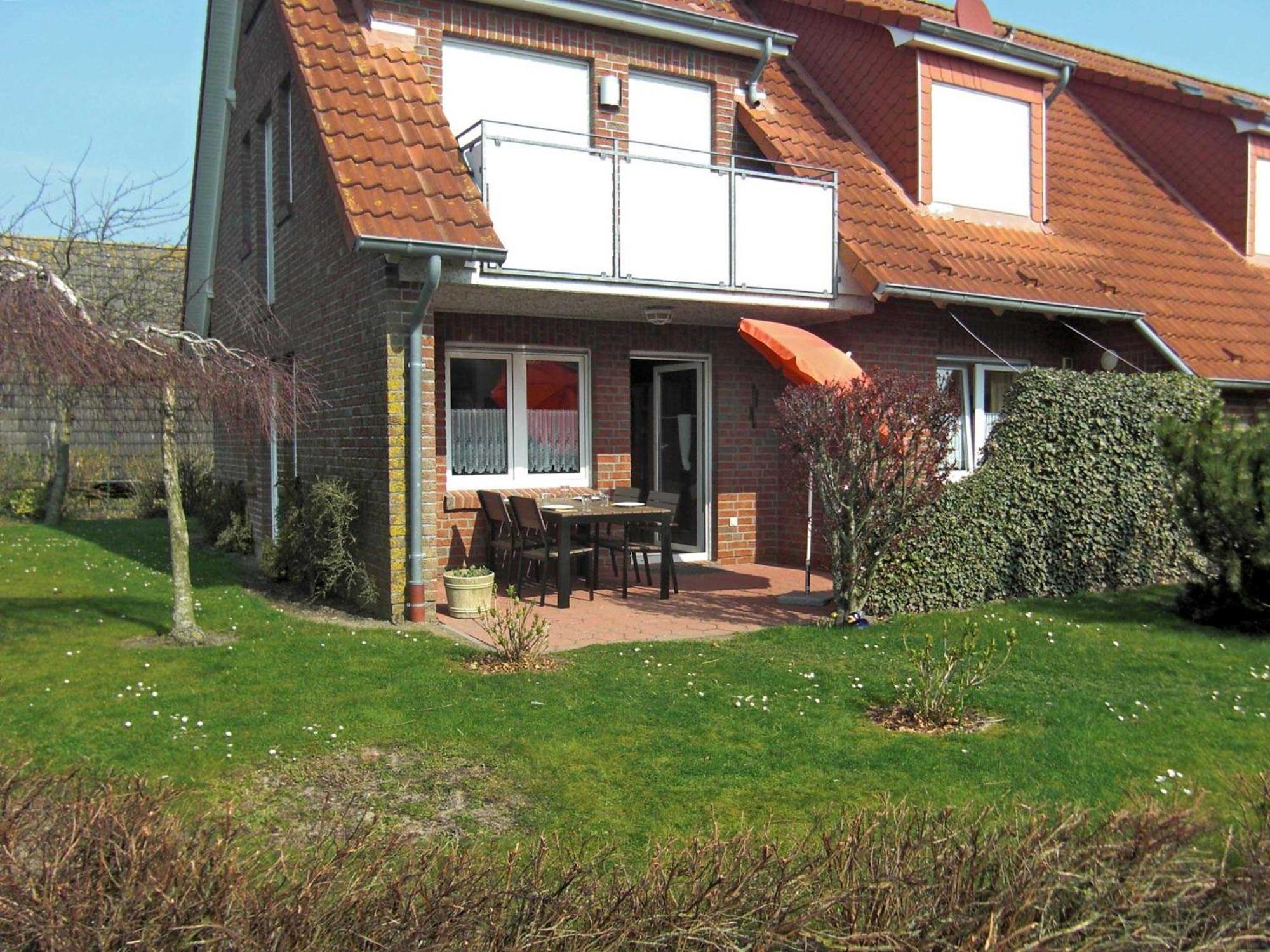 Ferienwohnung Haus "An Der Kurpromenade" Harlesiel Exterior foto